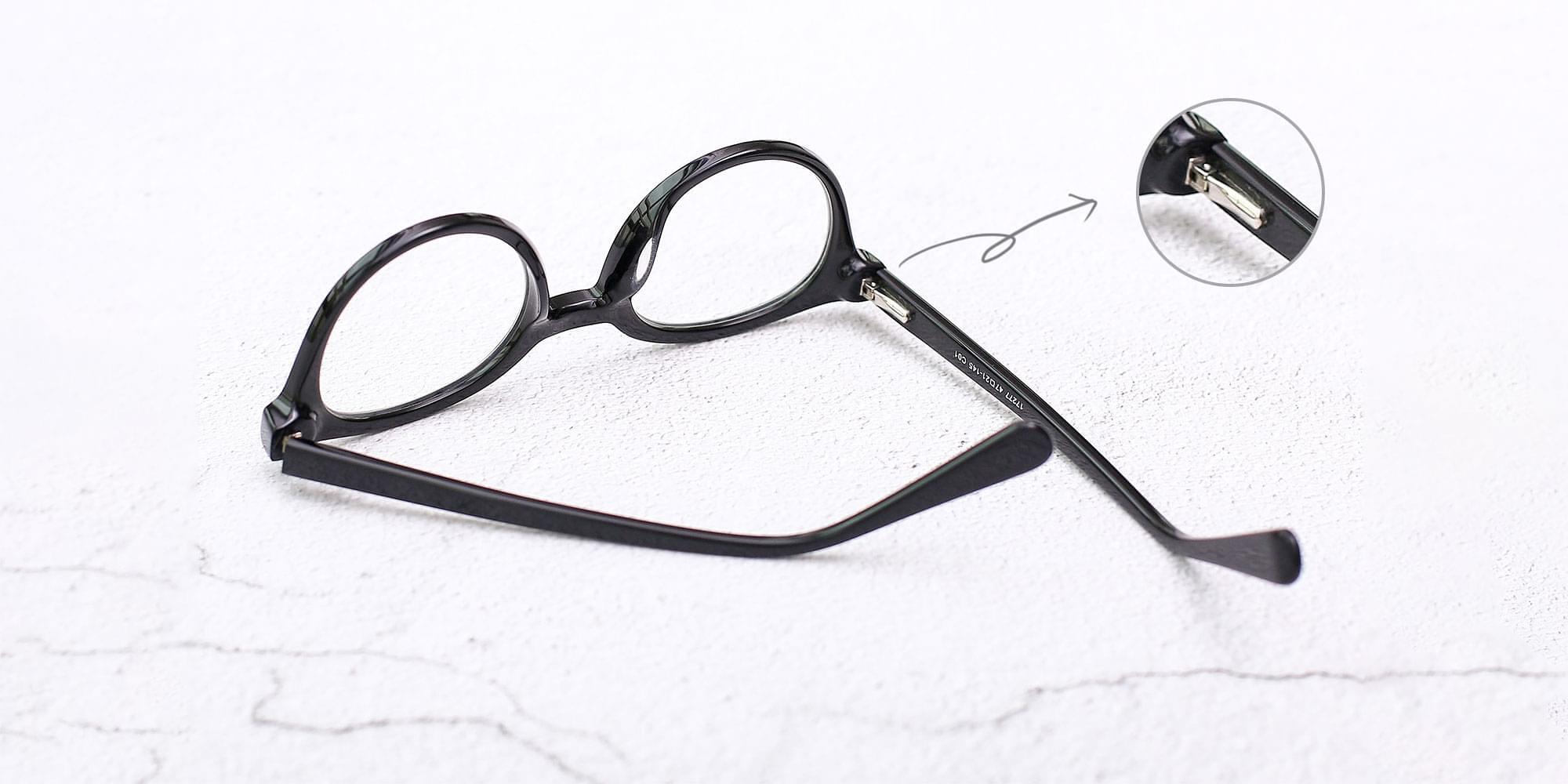Glasses with spring hinges