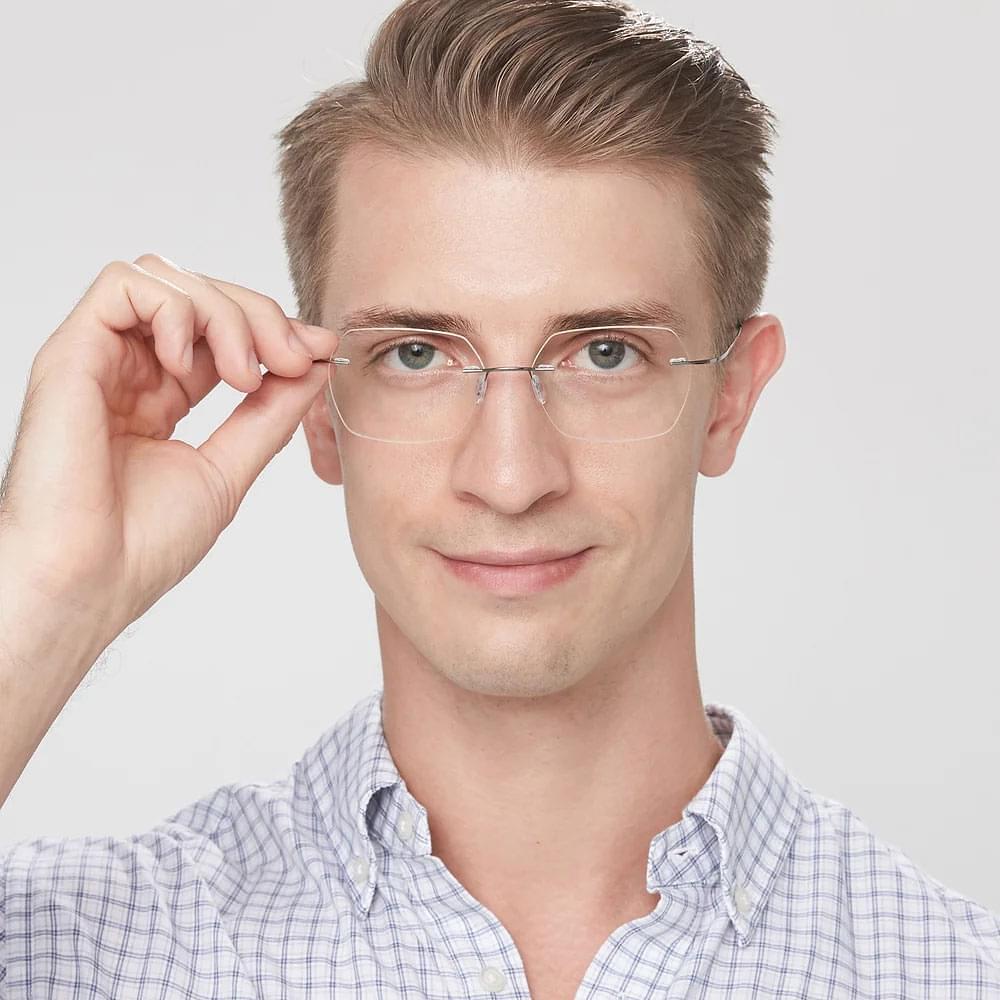 Geometric rimless glasses for men with unique style.